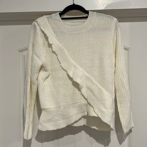 Cream color sweater from a local boutique.